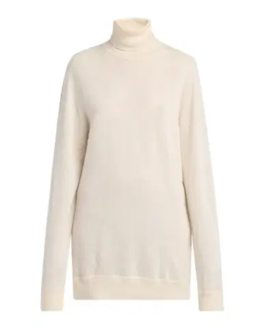 The Row Lizzy Cashmere Turtleneck Sweater | Thumbnail 1 The Row Lizzy Cashmere Turtleneck Sweater | Thumbnail 1