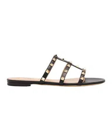 Valentino Garavani Rockstud Caged Leather Flat Slide Sandals | Thumbnail 1 Valentino Garavani Rockstud Caged Leather Flat Slide Sandals | Thumbnail 1