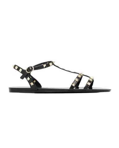 Valentino Garavani Rockstud Jelly Flat Gladiator Sandals | Thumbnail 1 Valentino Garavani Rockstud Jelly Flat Gladiator Sandals | Thumbnail 1