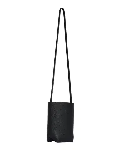 The Row Park North-South Crossbody Tote Bag in Leather | Thumbnail 1 The Row Park North-South Crossbody Tote Bag in Leather | Thumbnail 1