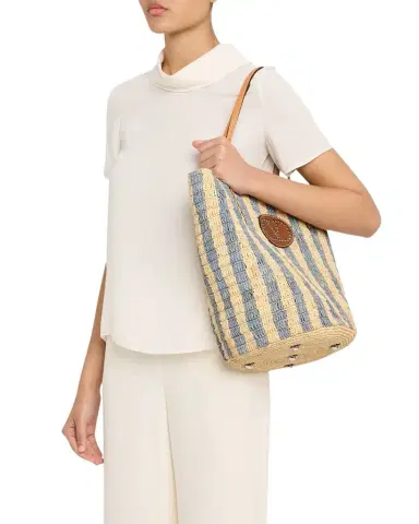 Valentino Garavani Striped Raffia Bucket Bag | Thumbnail 1 Valentino Garavani Striped Raffia Bucket Bag | Thumbnail 1