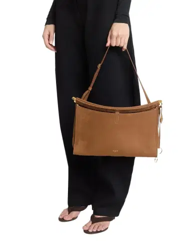 Alaïa Le Click Large East-West Suede Shoulder Bag | Thumbnail 1 Alaïa Le Click Large East-West Suede Shoulder Bag | Thumbnail 1