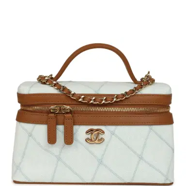 Chanel Chanel Coco Beach Top Handle Long Vanity Case with Chain Light Blue Denim and Brown Calfskin Gold Hardware | Thumbnail 1 Chanel Chanel Coco Beach Top Handle Long Vanity Case with Chain Light Blue Denim and Brown Calfskin Gold Hardware | Thumbnail 1