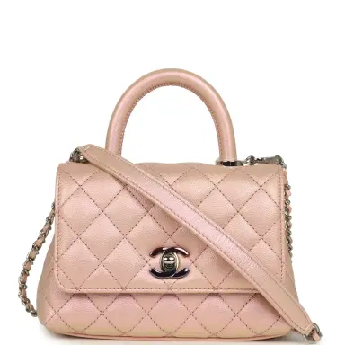 Chanel Chanel Micro Coco Top Handle Flap Iridescent Pink Shiny Caviar Mixed Metal Hardware | Thumbnail 1 Chanel Chanel Micro Coco Top Handle Flap Iridescent Pink Shiny Caviar Mixed Metal Hardware | Thumbnail 1