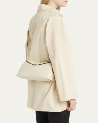 TOTEME T-Lock Clutch Bag in Pebble Grain Leather | Thumbnail 2 TOTEME T-Lock Clutch Bag in Pebble Grain Leather | Thumbnail 2