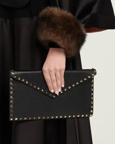 Valentino Garavani Large Rockstud Leather Flat Pouch Bag | Thumbnail 2