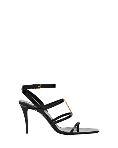 Saint Laurent Cassandra YSL Medallion Leather Stiletto Sandals | Thumbnail 1 Saint Laurent Cassandra YSL Medallion Leather Stiletto Sandals | Thumbnail 1