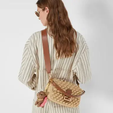 Fendi Iconic medium Baguette® bag, created in 1997, which went | Thumbnail 3 Fendi Iconic medium Baguette® bag, created in 1997, which went | Thumbnail 3