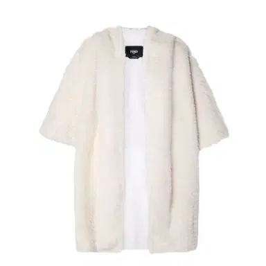 Fendi Hooded poncho that folds away for easy storage or travel | Thumbnail 1 Fendi Hooded poncho that folds away for easy storage or travel | Thumbnail 1