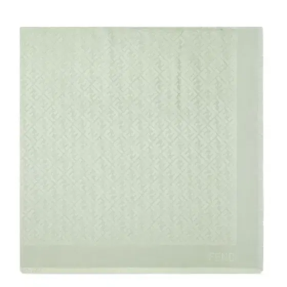 The iconic shawl is made of an organic silk and wool The iconic shawl is made of an organic silk and wool