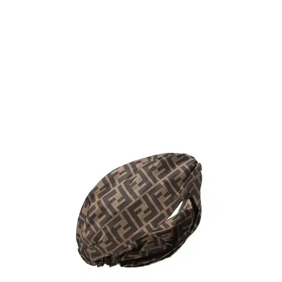 Hair band with a tie motif at the front and elasticated