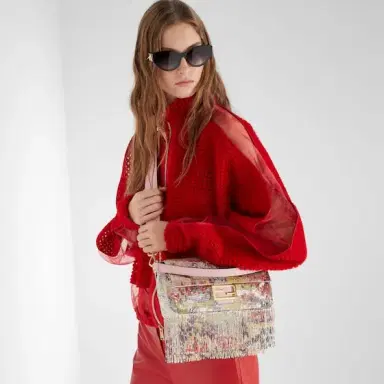 Fendi Iconic medium Baguette® bag, created in 1997, which went | Thumbnail 3 Fendi Iconic medium Baguette® bag, created in 1997, which went | Thumbnail 3