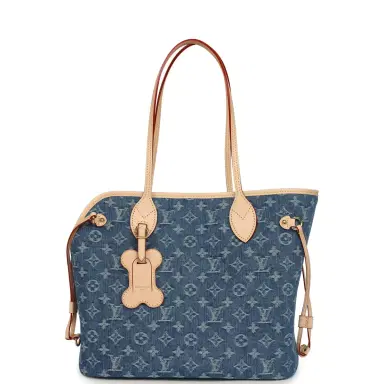 Louis Vuitton Louis Vuitton Neverwoof MM Blue Denim Monogram Gold Hardware | Thumbnail 1 Louis Vuitton Louis Vuitton Neverwoof MM Blue Denim Monogram Gold Hardware | Thumbnail 1
