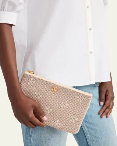 Valentino Garavani Eyelet-Embroidered Canvas Clutch Bag | Thumbnail 2 Valentino Garavani Eyelet-Embroidered Canvas Clutch Bag | Thumbnail 2