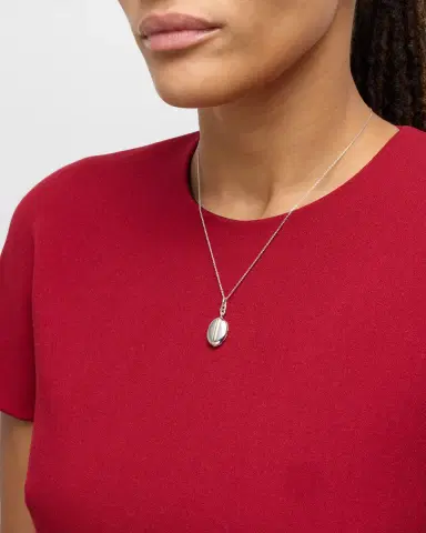 Monica Rich Kosann Sterling Silver Two-Tone Tess Slim Oval Locket Necklace | Thumbnail 1 Monica Rich Kosann Sterling Silver Two-Tone Tess Slim Oval Locket Necklace | Thumbnail 1