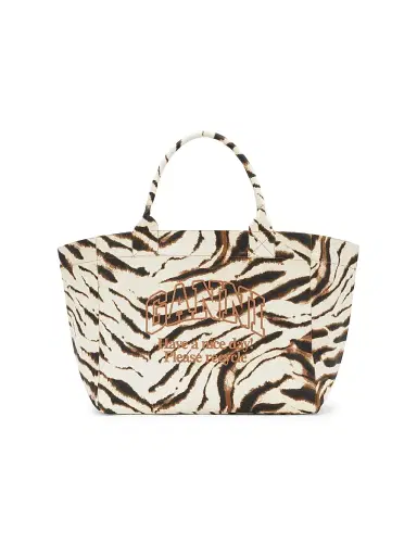 Ganni Women's Extra-Large Zebra-Print Cotton Tote Bag - White | Thumbnail 1 Ganni Women's Extra-Large Zebra-Print Cotton Tote Bag - White | Thumbnail 1