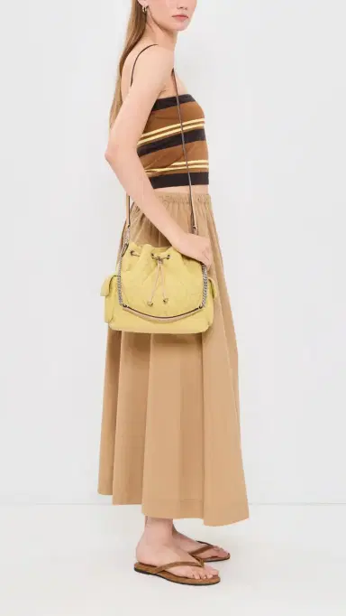 Tory Burch Charlie Quilted Denim Drawstring Shoulder Bag Yellow One Size | Thumbnail 3 Tory Burch Charlie Quilted Denim Drawstring Shoulder Bag Yellow One Size | Thumbnail 3