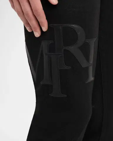 AMIRI Men's Staggered Logo Waxed Skinny Jeans | Thumbnail 4