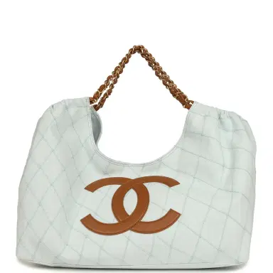 Chanel Chanel Maxi Coco Beach Cambon Hobo Bag Blue Denim and Brown Calfskin Brushed Gold Hardware | Thumbnail 1 Chanel Chanel Maxi Coco Beach Cambon Hobo Bag Blue Denim and Brown Calfskin Brushed Gold Hardware | Thumbnail 1
