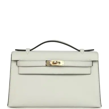 HERMÈS Hermes Kelly Pochette Gris Platine Swift Permabrass Hardware | Thumbnail 1 HERMÈS Hermes Kelly Pochette Gris Platine Swift Permabrass Hardware | Thumbnail 1