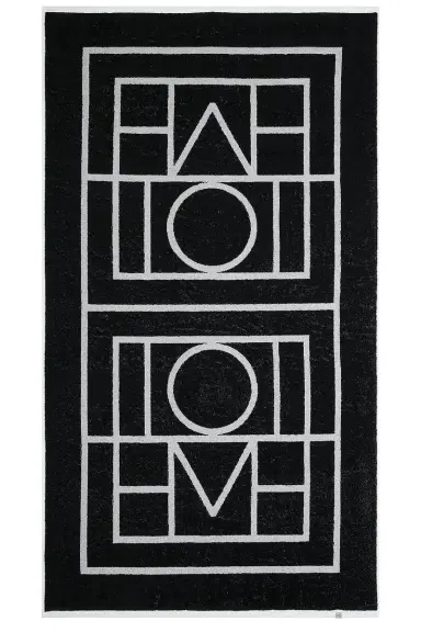 TOTEME Monogram Jacquard Beach Towel | Thumbnail 1 TOTEME Monogram Jacquard Beach Towel | Thumbnail 1