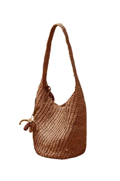 Helen Kaminski for FWRD Lani Raffia Crochet Bucket Bag With Palm Tree Charm | Thumbnail 1 Helen Kaminski for FWRD Lani Raffia Crochet Bucket Bag With Palm Tree Charm | Thumbnail 1