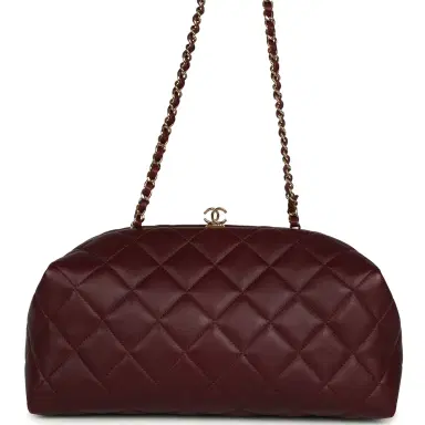 Chanel Chanel Large Quilted Clutch with Chain Dark Burgundy Lambskin Gold Hardware | Thumbnail 1 Chanel Chanel Large Quilted Clutch with Chain Dark Burgundy Lambskin Gold Hardware | Thumbnail 1