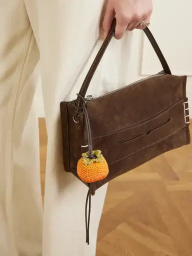 JW Anderson Persimmon Crocheted Cotton And Leather Bag Charm | Thumbnail 2