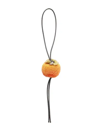 JW Anderson Persimmon Crocheted Cotton And Leather Bag Charm | Thumbnail 1