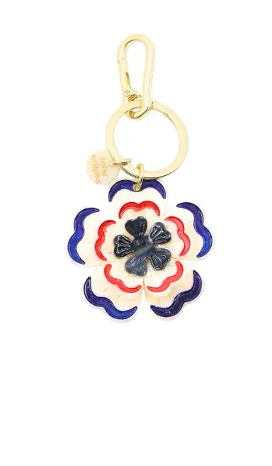 Solar Eclipse Hand-Painted Americana Flower Bag Charm & Keychain | Thumbnail 1 Solar Eclipse Hand-Painted Americana Flower Bag Charm & Keychain | Thumbnail 1