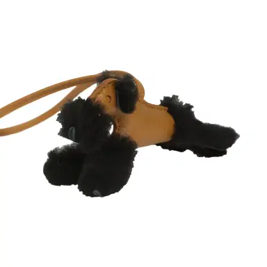 HERMÈS Hermes Budy Charm Kraft and Black Milo Lambskin and Merino Sheepskin | Thumbnail 2 HERMÈS Hermes Budy Charm Kraft and Black Milo Lambskin and Merino Sheepskin | Thumbnail 2