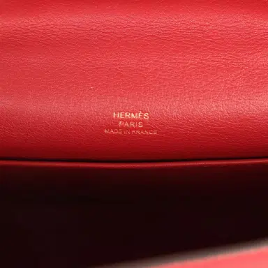 HERMÈS Pre-owned Hermes Kelly Pochette Rubis Swift Gold Hardware | Thumbnail 8 HERMÈS Pre-owned Hermes Kelly Pochette Rubis Swift Gold Hardware | Thumbnail 8