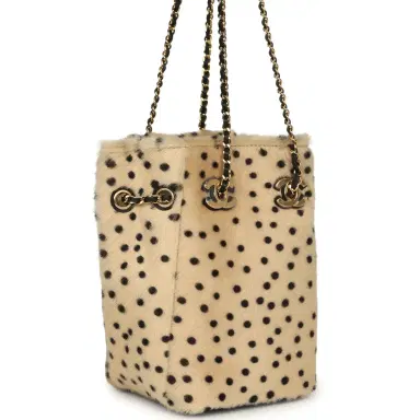 Chanel Chanel Mini "Cheetah Print" Bucket Bag with Chain Light Beige Calf Hair and Black Lambskin Gold Hardware | Thumbnail 2 Chanel Chanel Mini "Cheetah Print" Bucket Bag with Chain Light Beige Calf Hair and Black Lambskin Gold Hardware | Thumbnail 2