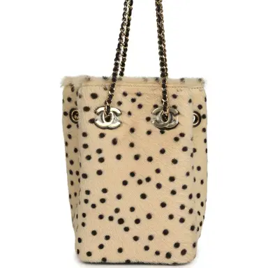 Chanel Chanel Mini "Cheetah Print" Bucket Bag with Chain Light Beige Calf Hair and Black Lambskin Gold Hardware | Thumbnail 1 Chanel Chanel Mini "Cheetah Print" Bucket Bag with Chain Light Beige Calf Hair and Black Lambskin Gold Hardware | Thumbnail 1