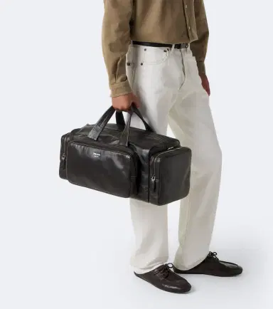 Prada Distressed leather duffel bag | Thumbnail 7