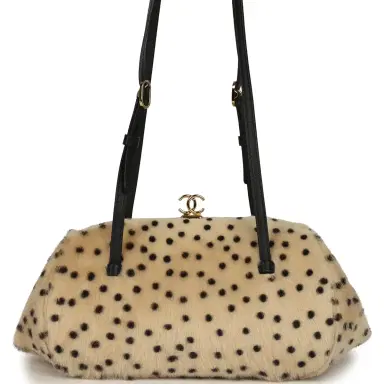 Chanel Chanel Cheetah Print Clutch with Leather Straps Light Beige Calf Hair, Black Leather Gold Hardware | Thumbnail 1 Chanel Chanel Cheetah Print Clutch with Leather Straps Light Beige Calf Hair, Black Leather Gold Hardware | Thumbnail 1