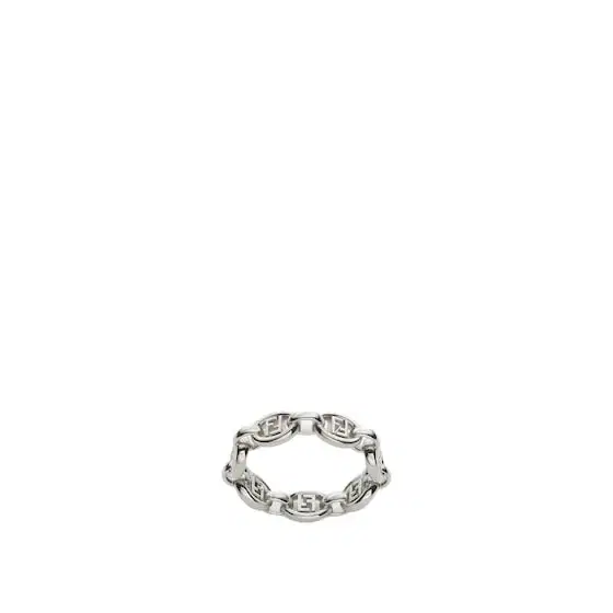 Ring with a rigid chain formed of oval elements decorated