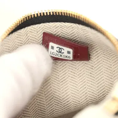 Chanel Chanel "Supple" Top Handle Long Vanity Case with Chain Black Grained Calfskin Gold Hardware | Thumbnail 11 Chanel Chanel "Supple" Top Handle Long Vanity Case with Chain Black Grained Calfskin Gold Hardware | Thumbnail 11