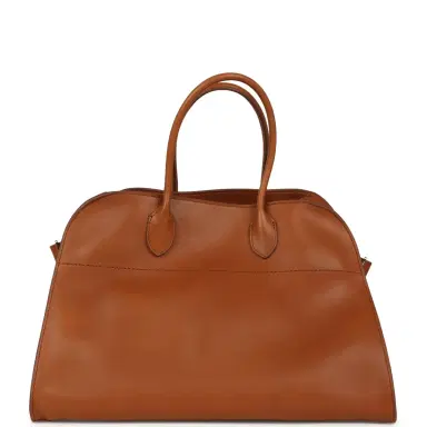 The Row The Row Soft Margaux 15 Bag Cuir Saddle Leather Gold Hardware | Thumbnail 1 The Row The Row Soft Margaux 15 Bag Cuir Saddle Leather Gold Hardware | Thumbnail 1