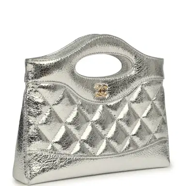 Chanel Chanel 31 Clutch with Chain Silver Metallic Calfskin Gold Hardware | Thumbnail 2 Chanel Chanel 31 Clutch with Chain Silver Metallic Calfskin Gold Hardware | Thumbnail 2