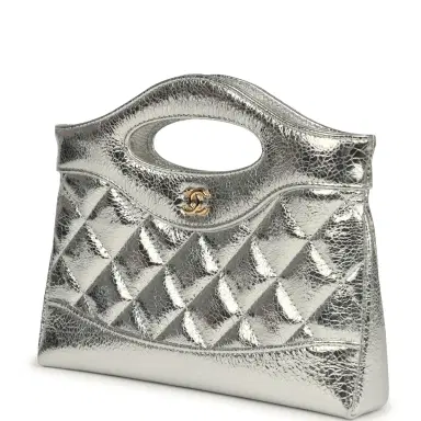Chanel Chanel 31 Clutch with Chain Silver Metallic Calfskin Gold Hardware | Thumbnail 5 Chanel Chanel 31 Clutch with Chain Silver Metallic Calfskin Gold Hardware | Thumbnail 5