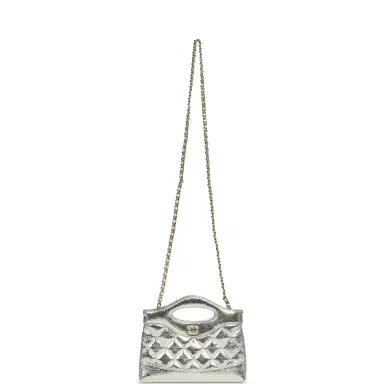 Chanel Chanel 31 Clutch with Chain Silver Metallic Calfskin Gold Hardware | Thumbnail 7 Chanel Chanel 31 Clutch with Chain Silver Metallic Calfskin Gold Hardware | Thumbnail 7