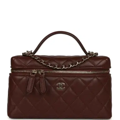 Chanel Chanel Top Handle Long Vanity Case with Chain Brown Lambskin Light Gold Hardware | Thumbnail 1 Chanel Chanel Top Handle Long Vanity Case with Chain Brown Lambskin Light Gold Hardware | Thumbnail 1
