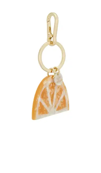 Solar Eclipse Hand-painted Citrus Slice Bag Charm + Keychain | Thumbnail 1 Solar Eclipse Hand-painted Citrus Slice Bag Charm + Keychain | Thumbnail 1