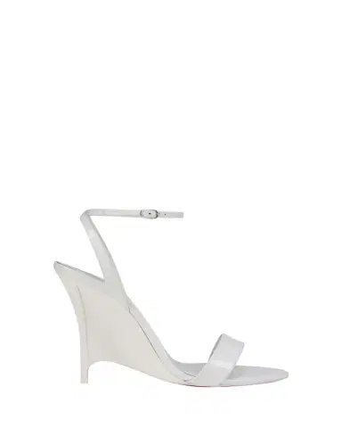 Christian Louboutin 100mm Zeezeenella Patent Leather Wedge Sandals | Thumbnail 1 Christian Louboutin 100mm Zeezeenella Patent Leather Wedge Sandals | Thumbnail 1