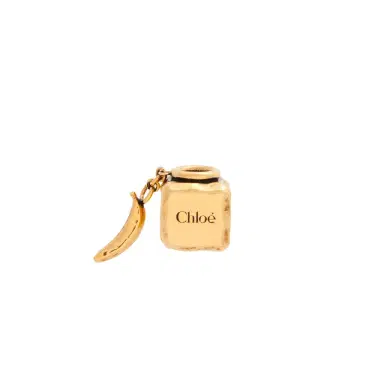 Chloé Cube Banana Dice bracelet charm in brass | Thumbnail 1 Chloé Cube Banana Dice bracelet charm in brass | Thumbnail 1