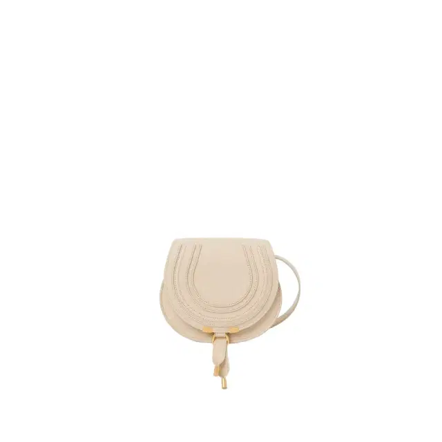 Small Marcie saddle bag in grained leather