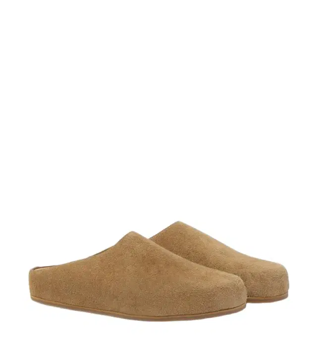 Studio Nicholson Wearing suede mules