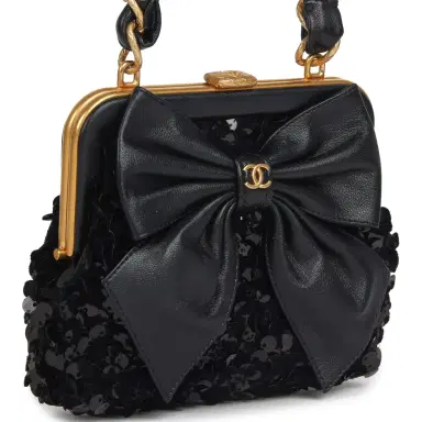 Chanel Pre-owned Chanel Mini Clutch with Bow Crossbody Bag Black Shiny Lambskin, Sequin Antique Gold Hardware | Thumbnail 2