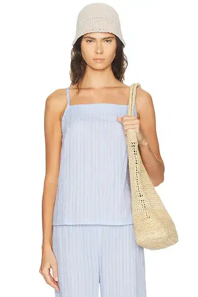 DONNI. The Eyelet Pop Shell Top